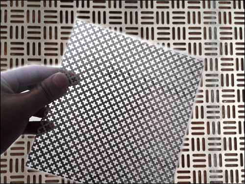 Etched and precison punched metal mesh