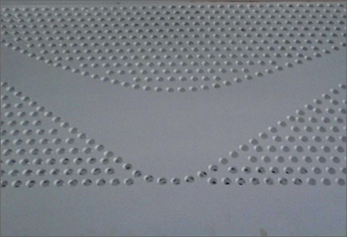 Perforated plate for ceiling grilles