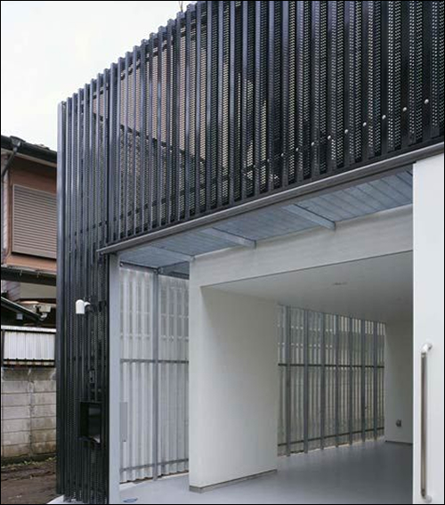 Corrugated metal sheet for facade cladding curtains